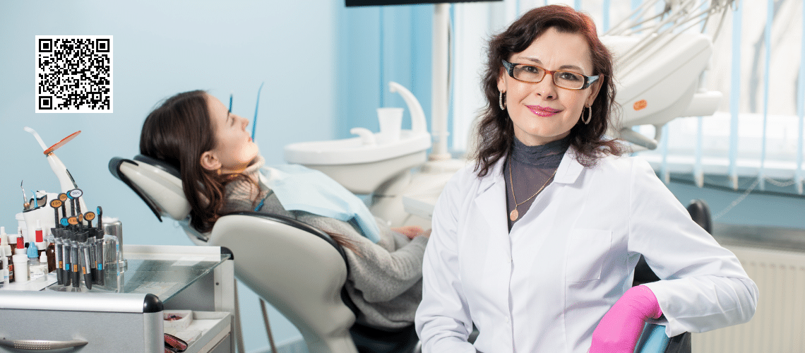 A top dentist in the United States treating the teeth of a patient.